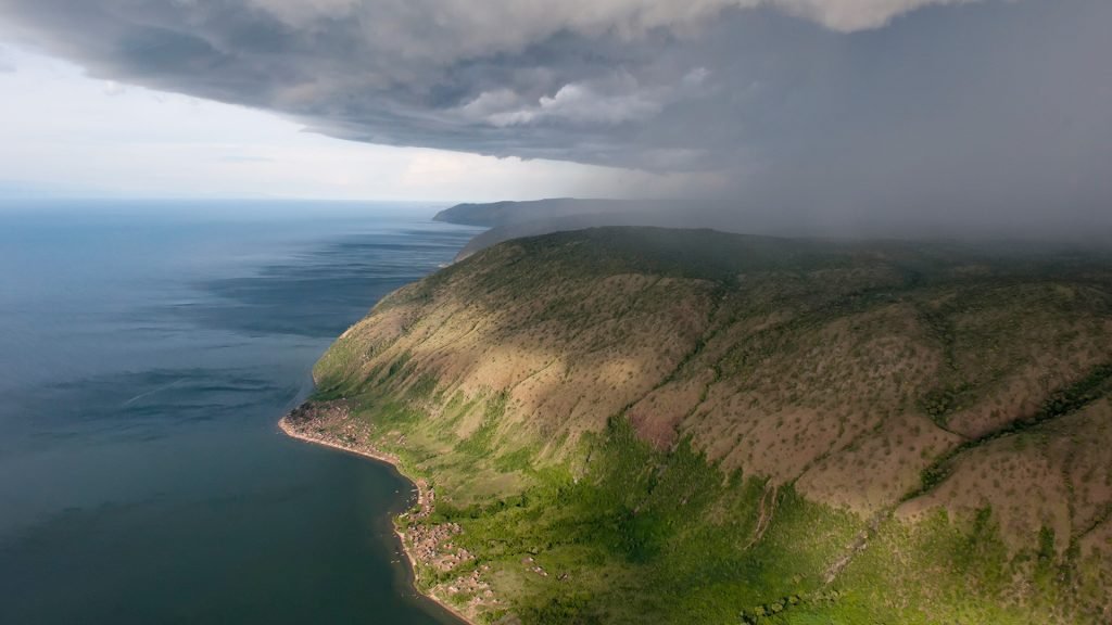 Thumbnail of A thunderstorm moves over the eastern shore of Lake Albert, Albertine Rift, Uganda | Windows Spotlight Images