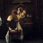 Thumbnail of a woman's body is a haunted house