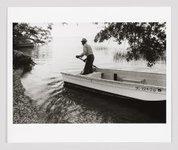 Thumbnail of Jeanne Moutoussamy-Ashe | Jake and his Boat Arriving on Daufuskie’s Shore, Daufuskie Island, SC