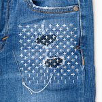 Thumbnail of Instead of hiding rips and tears, the visible mending movement turns them into art