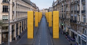 Thumbnail of Artist Transforms Humble Shipping Containers Into Monumental Gold Columns