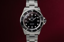 Thumbnail of 2000 Rolex Submariner 14060 with Papers & Serialized Hang Tag | Tropical Watch