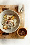 Thumbnail of spaghetti met artisjok, gorgonzola en krokante pompoenpitten | delicious.magazine